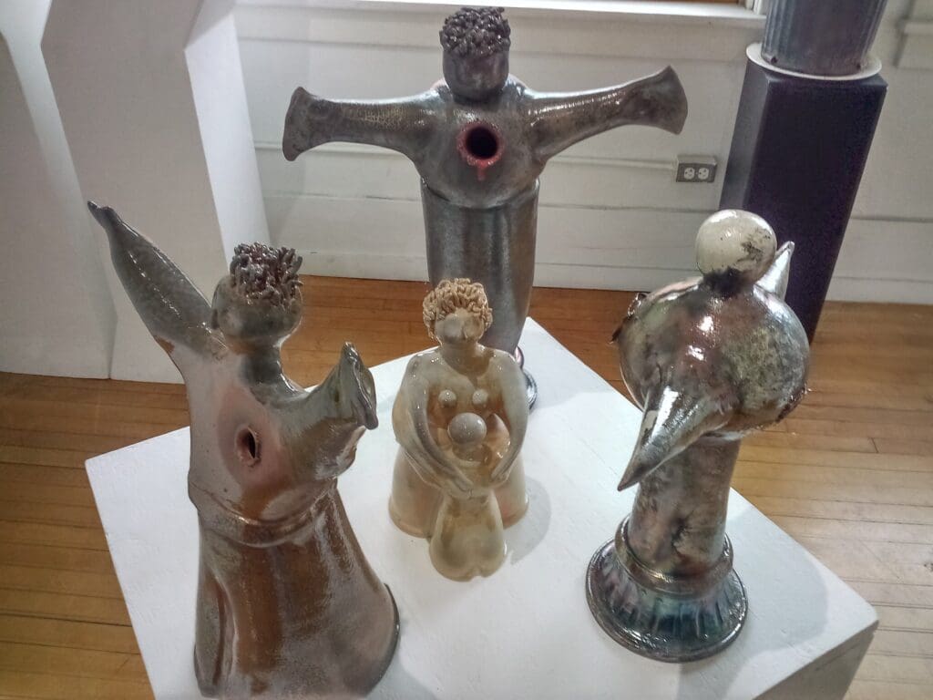 A group of different types of ceramic figurines.