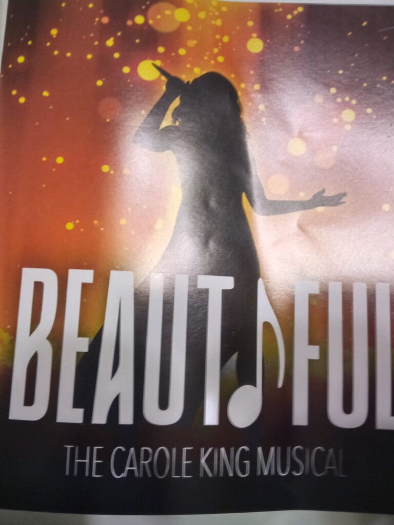 A poster of the carole king musical beautiful.