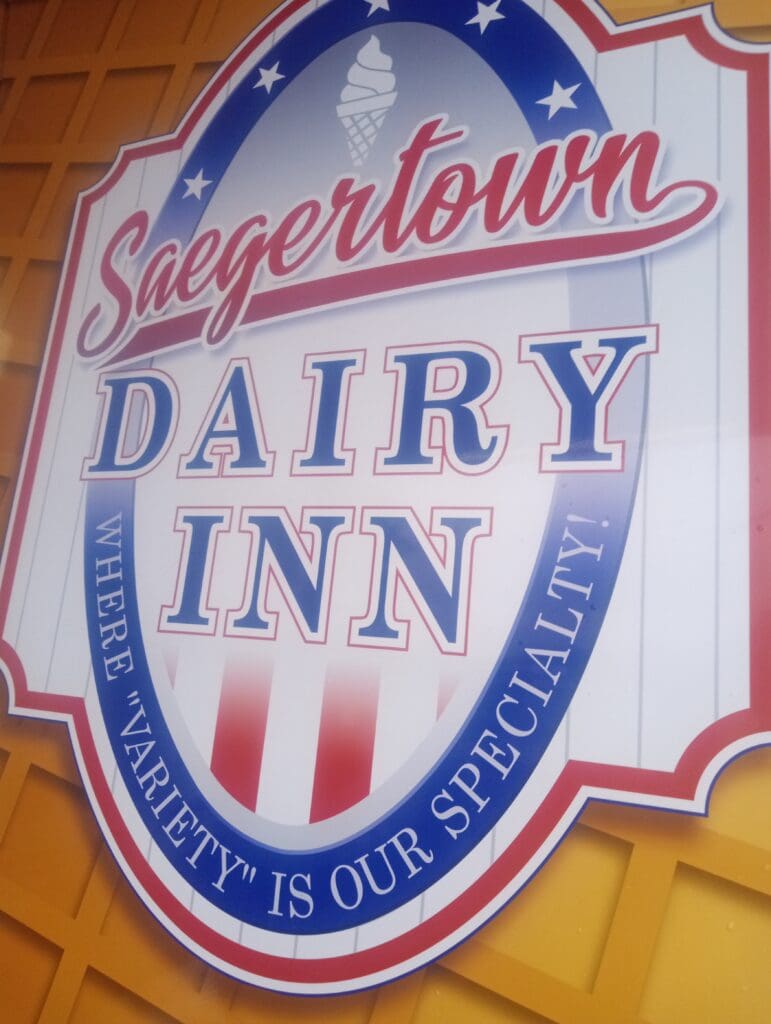 Saegertown Dairy Inn sign with slogan.