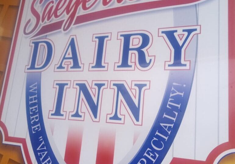 Saegertown Dairy Inn sign with slogan.