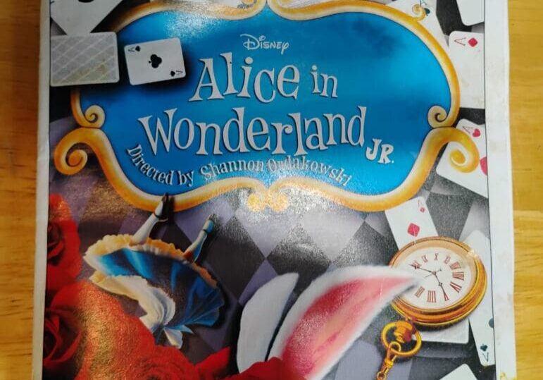 Alice in Wonderland Jr. theater performance poster.