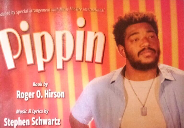 Pipin musical poster featuring cast member.