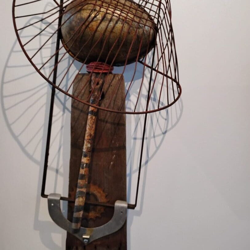 Metal and wood abstract art sculpture.